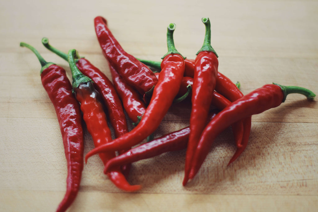 Cayenne Agrumato Fused Whole Pepper Olive Oil